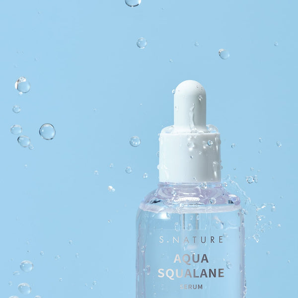 S.Nature Aqua Squalane Hyaluronic Acid Serum in a refined bottle, combining squalane and hyaluronic acid for intense hydration, skin barrier support, and improved elasticity, perfect for all skin types.